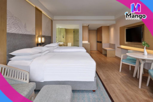 Large Double Room with Two Double Beds and Pool View