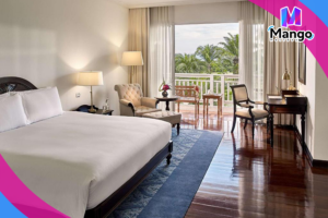 جناح جونيور كينغ مع شرفة وإمكانية الدخول إلى النادي - إطلالة عَلى الحديقة