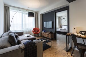 Penta Suite is a two-room suite with a living room and a bedroom