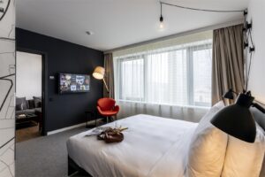 Penta Suite is a two-room suite with a living room and a bedroom