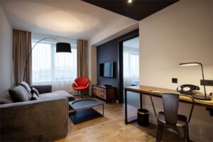 Penta Suite is a two-room suite with a living room and a bedroom