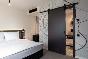 Penta Suite is a two-room suite with a living room and a bedroom