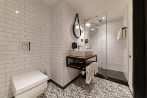 Penta Suite is a two-room suite with a living room and a bedroom